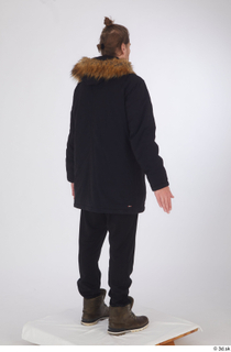  Arvid black coat black joggers black parka brown shoes brown winter boots dressed sports standing whole body 0006.jpg